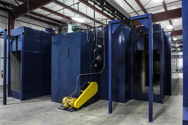Blue convection oven with yellow recirculation ductwork at floor level