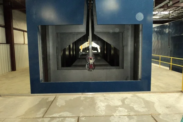 Looking down the length of a large-part horizontal convection oven