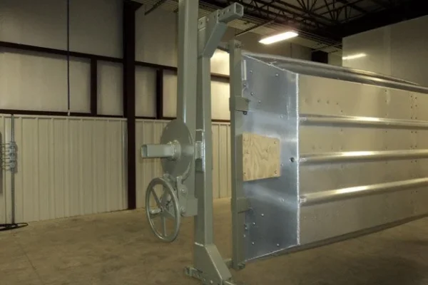 Galvanized conveyor load bar section staged on the shop floor