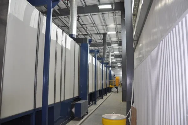 Translucent polypropylene washer housing panels running along the line