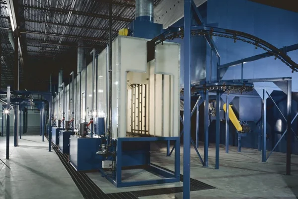 Washer and conveyor line viewed down the plant aisle
